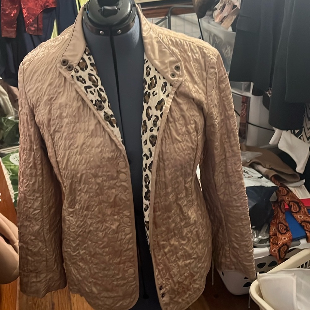 Chicos car length coat size 2 which is like a medium . No stains or tears